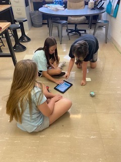 Students working with Spheros