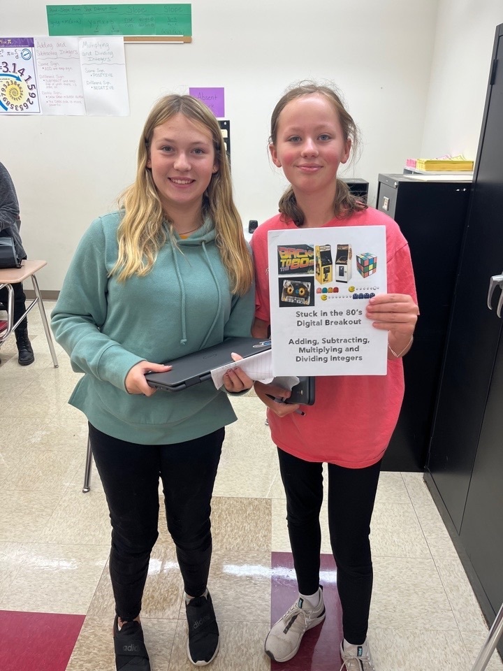 students showing their prize