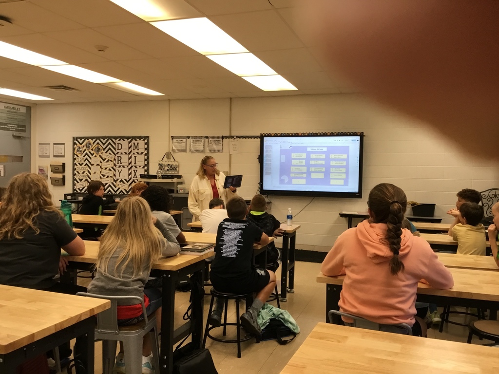 Mrs. Reindl teaching students how to connect and code